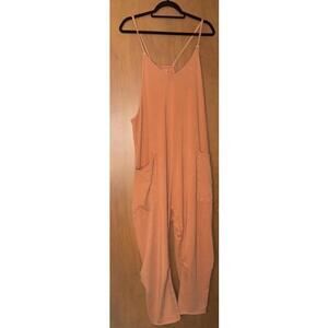 Free People FP Movement Hot Shot Jumpsuit Size L Orange Slouchy Romper Halloween